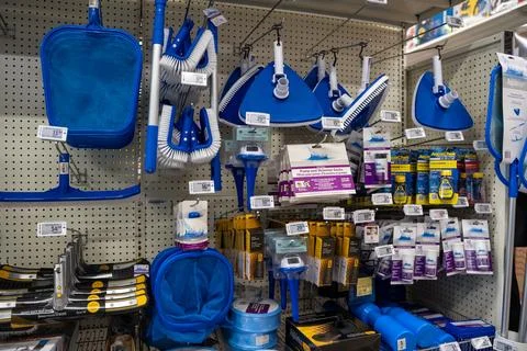 View of swimming pool cleaning tools and accessories on store display. Toronto, Stock Photos