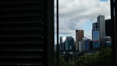 View of Sydney cityscape window shutter then closes 6K Stock Footage 309070039