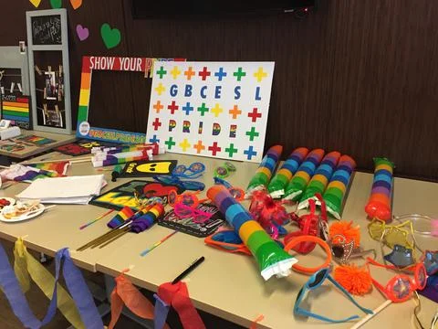 View of table full of craft supplies for celebrating Pride Month Stock Photos