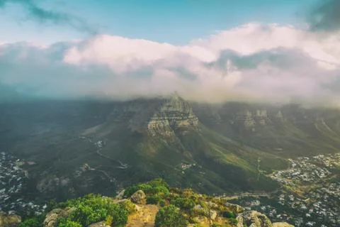 View of Table Mountain covered with clouds from Lion's head Stock Photos