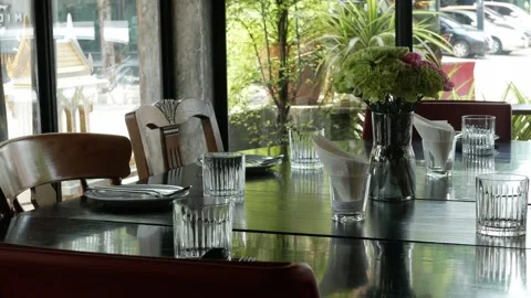 View to table with set of tableware dish and glass prepared ready for dinne.. Stock Footage 282335613