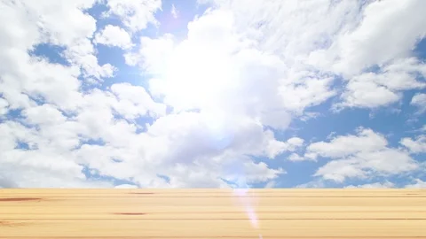 View from table on time lapse of clouds background. Stock Footage 129665471