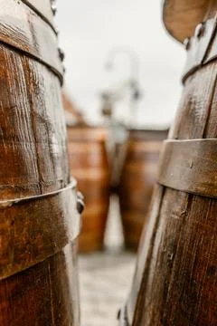 View of tables made with old oak barrels in a bar, cafe, restaurant on the Ra Stock Photos