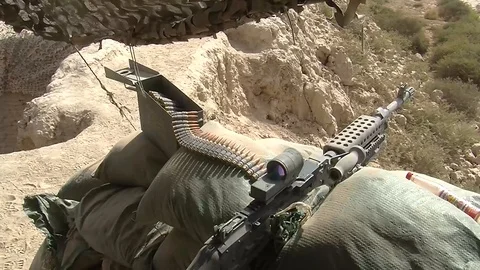 View of tactical mount for an US army sniper on top of a mountain in Afghanistan Vidéo 86295889