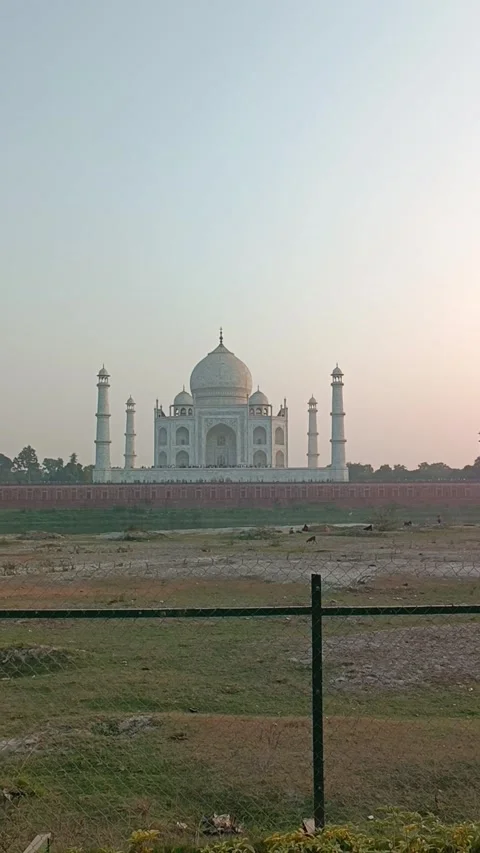 View of the Taj Mahal during the sunset hour from Taj View Point ADA Stock Footage 297765983