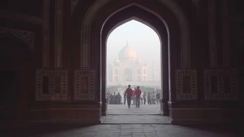 View of the Taj Mahal through arched entrance, Agra, India Stock Footage 101231359