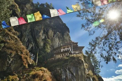 View of Taktshang Monastery through prayer flags 스톡 사진