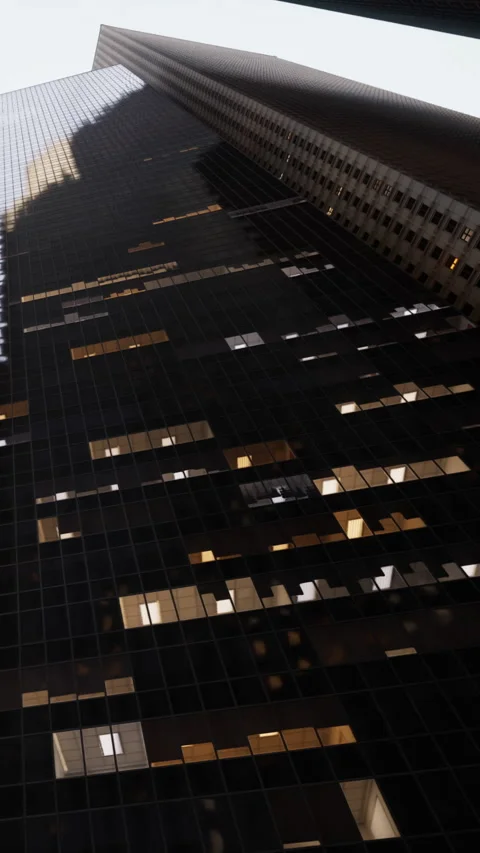 View of a tall building with light and shadow contrast during daytime Stock Footage 342183201