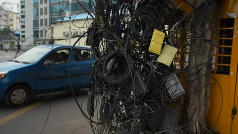 View of tangled electrical wires on a street in Dhaka, Bangladesh. Stock Footage 335556943