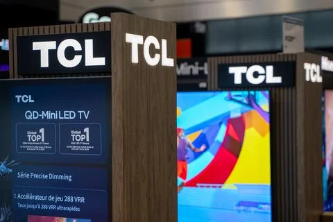 View of TCL television display inside electronics store. Toronto, Canada - Stock Photos
