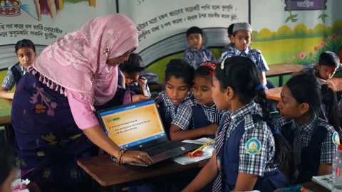 View of a teacher showing a laptop to students in Bogura, Bangladesh. Stock-Footage 335584865