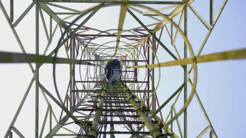 View of a technician climbing a telecommunications tower, Bangladesh. 스톡 동영상 335561656