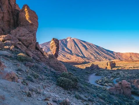View of Teide volcano and rocks during a sunny day from Roques de Garcia Stock Photos