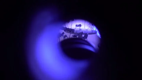 View into the Telescope of Working Ionic-Plasma Deposition Installation Stock Footage 91666678