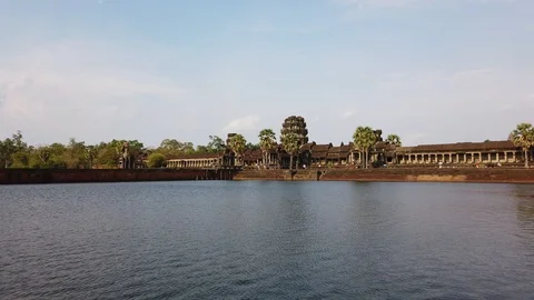 View of the temple of Angkor Wat across the moat in the evening. Stock Footage 105877312