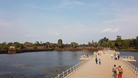 View of the temple of Angkor Wat across the moat in the evening. Stock Footage 105877432