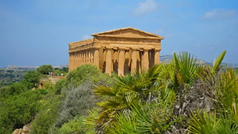 View of the Temple of Concordia in Agrigento with green grass foreground. Stock Footage 244344470