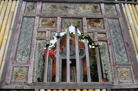 View of Temple Through Wooden-Bar Window Stock Photos