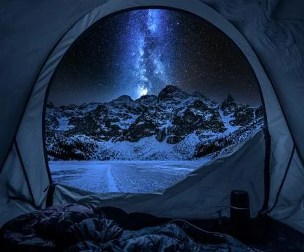 View from tent to Morskie Oko at night in winter Stock Photos