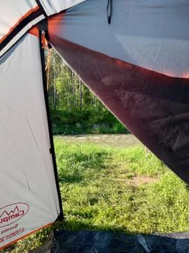 View from the tent to the mountain river Stock Photos