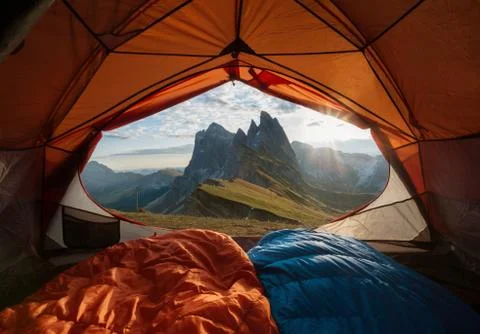 View from tent to the mountain. Sport and active life concept Stock Photos