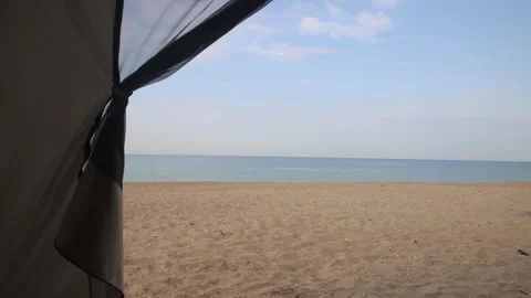 View from the tent to the sandy beach Stock Footage 283853882