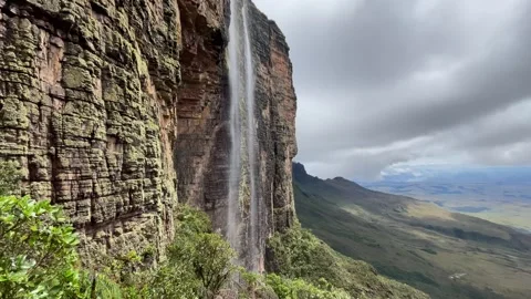 View of Tepuy Roraima sheer stone wall with waterfalls, Venezuela Stock-Footage 247967957