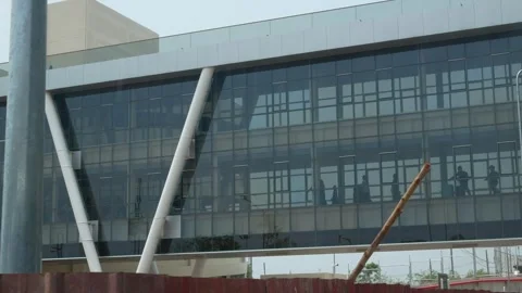 View to terminal connection walkway building area with many passengers walk.. Stock Footage 258750482