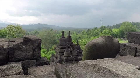 View from the terrace of the Borobudur Temple, statue of Buddha, Java, Indonesia Stock Footage 148993295
