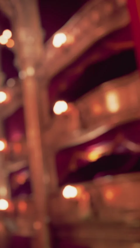 View of a theater stage from the side with red curtains in the foreground Stock Footage 337938185
