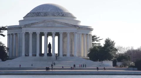 View of the Thomas Jefferson Memorial from the water with a plane taking off Stock Footage 46845264