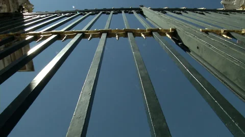 View though gates at Madrid's Royal Palace Stock Footage 34799007