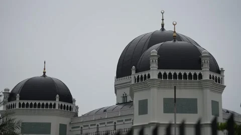 View of the three black domes of the mosque Stock Footage 259004318