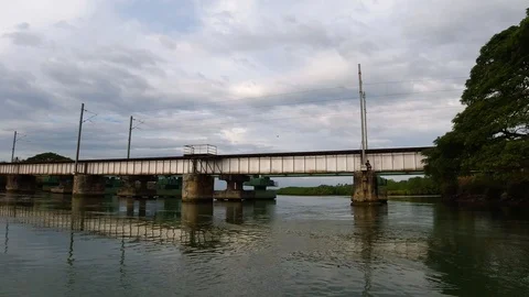 View of three bridges from below, during a boat ride, India Stock Footage 122573061