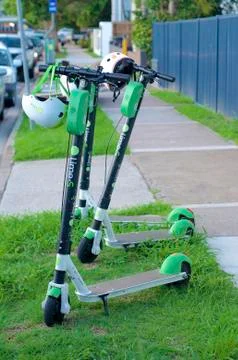 View of three Lime E-scooters Stock Photos