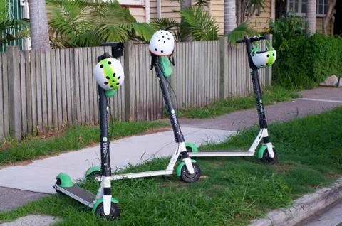 View of three Lime E-scooters Stock Photos