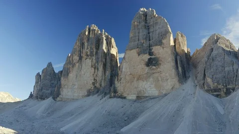 View of the Three Peaks  of Lavaredo Mountains going up Stock Footage 128949406