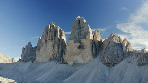 View of the Three Peaks  of Lavaredo Mountains with clouds Stock Footage 128963190