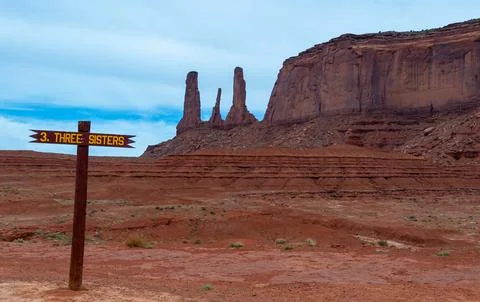 View of the Three Sisters red rocks In Monument Valley, Navajo Nation,  Ari.. Stock Photos