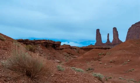 View of the Three Sisters red rocks In Monument Valley, Navajo Nation,  Ari.. Stock Photos