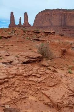 View of the Three Sisters red rocks In Monument Valley, Navajo Nation,  Ari.. Stock Photos