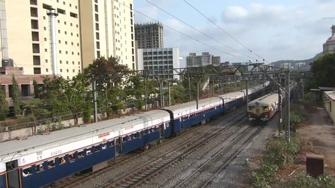 View of Three speeding indian trains in one frame, Mumbai Maharashtra India Stock Footage 100226291