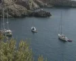 View of three stationary yachts in bay SD Footage