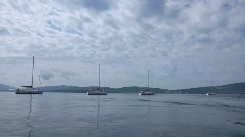 View on three yachts lined up on Adriatic sea Stock Footage 101661671