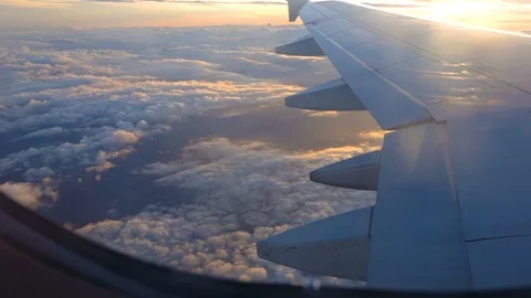 View through aircraft window, beautiful sky and clouds Stock Footage 87323404