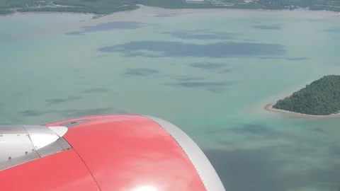 View through airplane aircraft window with jet engine while flying take off.. Stock Footage 282336287