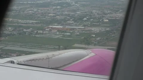View through airplane aircraft window with jet engine while flying climbing.. Stock Footage 289815707