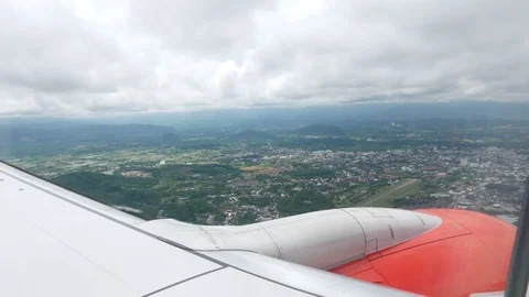 View through an airplane, Flying above Chiang Rai, Thailand Stock Footage 77837352