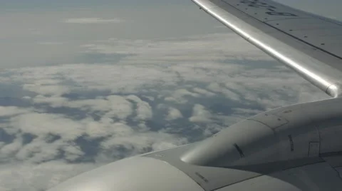 View through an airplane window. a composition with an aircraft engine Stock Footage 63940821