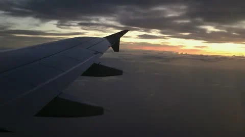 View through airplane window at dusk Stock Footage 10806279